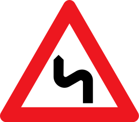 Traffic sign of Denmark: Warning for a double curve, first left then right