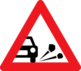 Traffic sign of Denmark: Warning for loose chippings on the road surface