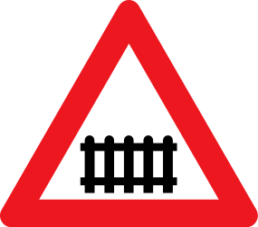Traffic sign of Denmark: Warning for a railroad crossing with barriers