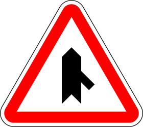 Traffic sign of Portugal: Warning for a crossroad with a sharp side road on the right