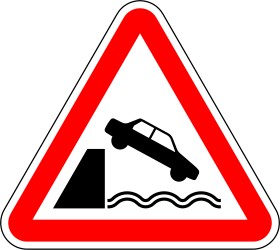 Traffic sign of Portugal: Warning for a quayside or riverbank